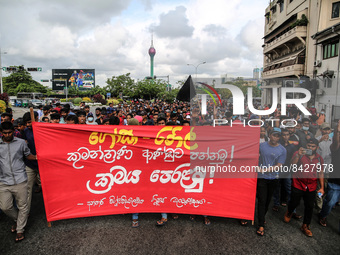 Sri Lankan university students march, against Sri Lanka's President Gotabaya Rajapaksa while demanding his resignation, amid the country's e...