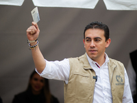 Colombia's national registrar Alexander Vega votes during the voting rally for the presidential runoffs between left-wing Gustavo Petro and...
