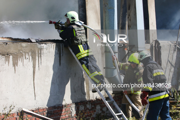 KHARKIV, UKRAINE - JUNE 20, 2022 - Firefighters put out a fire at a warehouse in an industrial area after the shelling of Russian troops, Kh...
