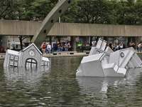 Art installation entitled 'Over Floe' by Toronto artist John Notten floating in the water at Nathan Phillips Square in downtown Toronto, Ont...