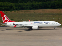 a Turkish airlines aircrat is seen parked at Cologne & Bonn airport in Cologne, Germany on June 21, 2022 as airline is dealing with staff sh...