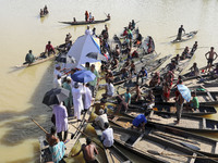 A local NGO workers distribute medicine and relief material to flood affected people in Sylhet, Bangladesh on June 24, 2022. (