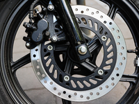 Disc brakes of a motorcycle parked in Krakow, Poland on June 23, 2022. (