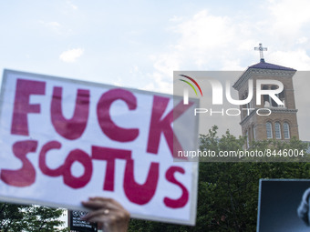 A protestor holds a sign during a protest against the Supreme Courts decision to overturn Roe V. Wade on Friday June 24, 2022 in New York, N...