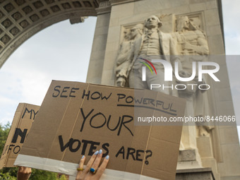 Protestors hold signs during a protest against the Supreme Courts decision to overturn Roe V. Wade on Friday June 24, 2022 in New York, NY....