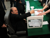 President Abdelaziz Bouteflika casts his vote in a polling centre in El
Biar suburb, in upper Algiers, on April 17, 2014. Algerians headed t...