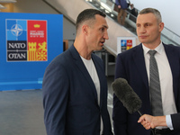 Wladimir Klitschko and Vitali Klitschko talk to the media during the NATO Summit in Madrid, Spain on June 29, 2022. (