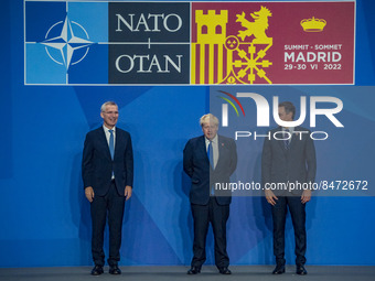 Secretary General of NATO, Jens Stoltenberg, left, the Prime Minister of the United Kingdom, Boris Johnson, center, and the president of Spa...