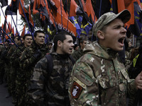 Activists and supporters of the Right Sector political party attend a rally to celebrate the 73st anniversary of the Ukrainian Insurgent Arm...