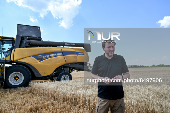 ZAPORIZHZHIA REGION, UKRAINE - JULY 05, 2022 - Head of the Zaporizhzhia RMA Oleksandr Starukh  is seen in the field during the grain harvest...