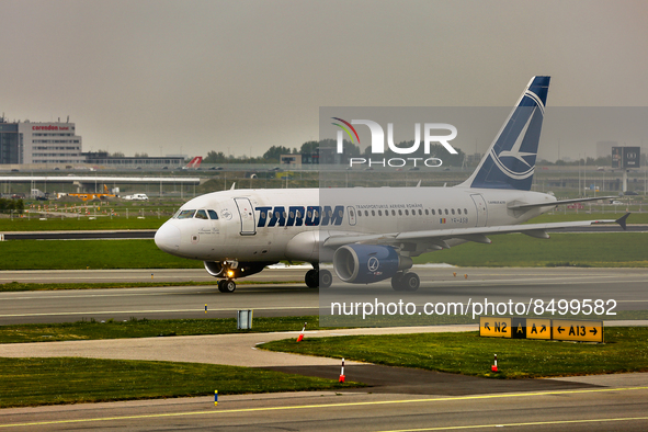 Tarom Romanian Air Transport A318-111 airplane at Amsterdam Airport Schiphol in Amsterdam, Netherlands, on May 03, 2022. 