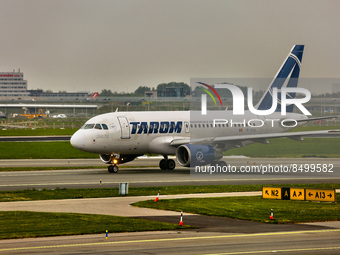 Tarom Romanian Air Transport A318-111 airplane at Amsterdam Airport Schiphol in Amsterdam, Netherlands, on May 03, 2022. (