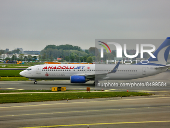 Anadolu Jet Boeing 737 airplane at Amsterdam Airport Schiphol in Amsterdam, Netherlands, on May 03, 2022. (