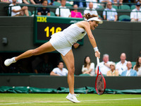 Tatjana Maria of Germany in action against Jule Niemeier of Germany during the quarter-final of the 2022 Wimbledon Championships, Grand Slam...