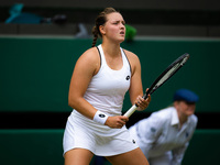 Jule Niemeier of Germany in action against Tatjana Maria of Germany during the quarter-final of the 2022 Wimbledon Championships, Grand Slam...