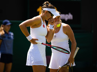 Nicole Melichar-Martinez of the United States & Ellen Perez of Australia in action during the doubles quarter final of the 2022 Wimbledo...