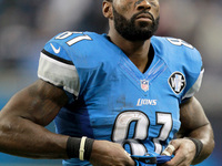 Detroit Lions wide receiver Calvin Johnson (81) walks off the field after an NFL football game against the Chicago Bears in Detroit, Michiga...