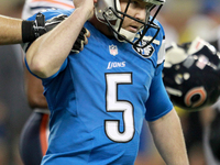  Detroit Lions kicker Matt Prater (5) celebrates after kicking the game winning field gold against the Chicago Bears of an NFL football game...