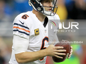 Chicago Bears quarterback Jay Cutler (6) looks to pass during the overtime period of an NFL football game against the Detroit Lions in Detro...