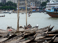 Children play in the Buriganga River during high temperature weather in Dhaka, Bangladesh, On July 22, 2022 (