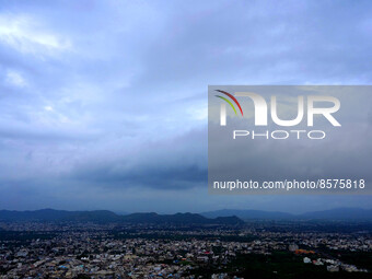  Monsoon clouds gather in the sky above Ajmer city, Rajasthan, Saturday, July 23, 2022. (