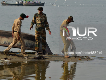 Indian cadets of NCC (National Cadet Corps) clean the garbages on the banks of River Ganges under programme of National Mission For Clean Ga...