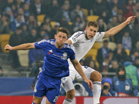Artem Kravets (R) of Dynamo vies for the ball with Gary Cahill (L) of Chelsea during the UEFA Champions League Group G soccer match between...