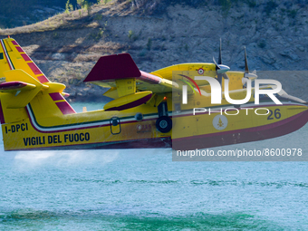 A Canadair CL-415 of the Fire Brigade, while loading water into the Salto Lake reservoir in the Province of Rieti. In Rieti, Italy, on 29 Ju...
