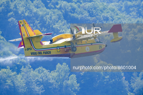 A Canadair CL-415 during take-off after refuelling in Lago del Salto, in the Province of Rieti, Italy, on 29 July 2022.  