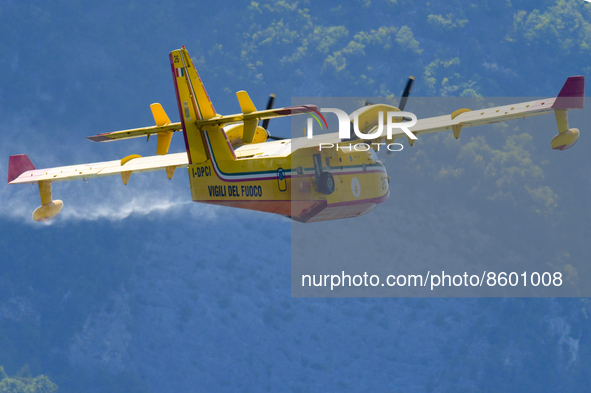 A Canadair CL-415 during take-off after refuelling in Lago del Salto, in the Province of Rieti, Italy, on 29 July 2022.  