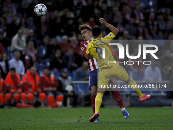 SPAIN, Madrid:Atletico de Madrid's French forward Antoine Griezmann and Astana´s Kazakhstani forward Zhukov during the UEFA Champions League...