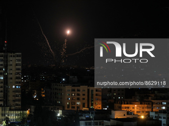 A picture taken on August 5, 2022, shows Palestinian rockets fired from in Gaza City in retaliation to earlier Israeli airstrikes. (