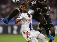 Tete of Olympique Lyonnais and Cedric Avinel of AC Ajaccio compete for the ball during the Ligue 1 match between Olympique Lyonnais and AC A...