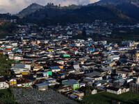 Village houses and mosques are seen in the Dieng mountain area in Banjarnegara, Central Java province, Indonesia, on August 6, 2022. (