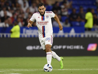 Rayan Cherki of Olympique Lyonnais runs with the ball during the Ligue 1 match between Olympique Lyonnais and AC Ajaccio at Groupama Stadium...