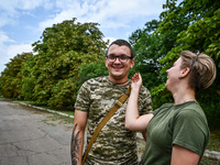 ZAPORIZHZHIA REGION, UKRAINE - AUGUST 05, 2022 - A married couple of 19-year-olds from Ivano-Frankivsk serve in the TerDefence brigade in Za...