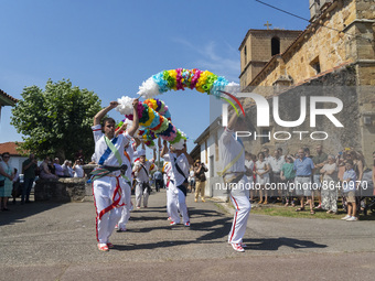 The dancers go through the streets of the town, from early in the morning, during the festival of San Mames in Navajeda (Cantabria), in this...