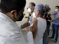 August 8, 2022, Mexico City, Mexico: Health personnel apply the CanSino Covid19 vaccine for adults in the first dose or booster dose at the...