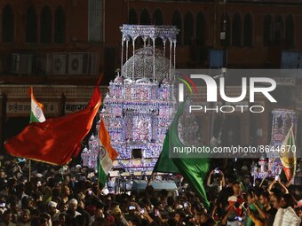 Indian Muslims carry ' Tazia's ' as they take part in a Muharram procession in the wee hours of Tuesday at walled city of Jaipur, Rajasthan,...