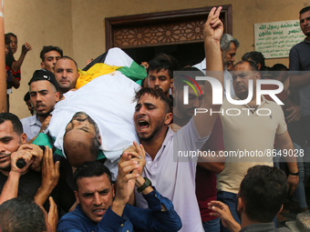 The body of Ibrahim Abu Salah during his funeral in Beit Hanoun, northern Gaza Strip, on August 10, 2022, after being killed during the late...