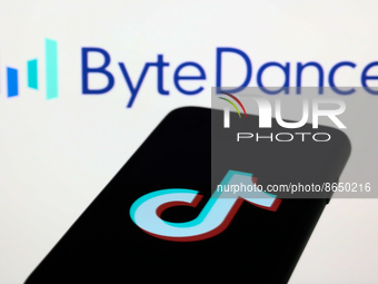 ByteDance logo displayed on a screen and TikTok logo displayed on a phone screen are seen in this illustration photo taken in Krakow, Poland...
