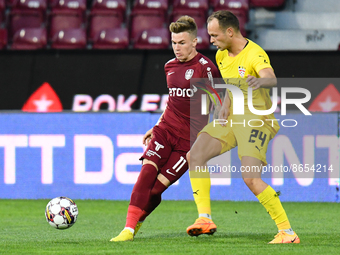 Claudiu Petrila in action against Luka Simunovic during UEFA Europa Conference League, 3rd preliminary round: CFR Cluj v. Şahtior Soligorsk,...