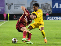 Gabriel Debeljuh in action against Vitor Feijao during UEFA Europa Conference League, 3rd preliminary round: CFR Cluj v. Şahtior Soligorsk,...