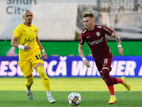 Claudiu Petrila in action against Valon Ahmedi during UEFA Europa Conference League, 3rd preliminary round: CFR Cluj v. Şahtior Soligorsk, 1...