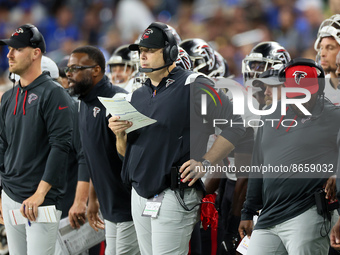 Head coach Arthur Smith (center) of the Atlanta Falcons looks on from the sidelines during an NFL preseason football game between the Detroi...