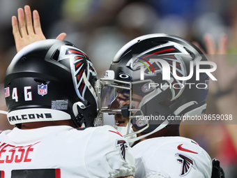 Quarterback Marcus Mariota (1) of the Atlanta Falcons is congratulated after making a touchdown during an NFL preseason football game betwee...