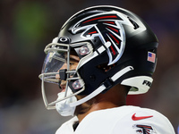 Quarterback Marcus Mariota (1) of the Atlanta Falcons walks on the field after making a touchdown during an NFL preseason football game betw...