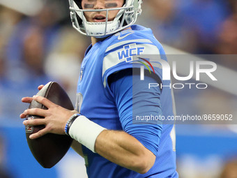 Quarterback Tim Boyle (12) of the Detroit Lions looks to pass the ball during an NFL preseason football game between the Detroit Lions and t...