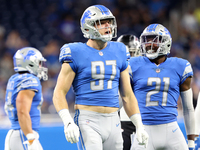 Detroit Lions defensive end Aidan Hutchinson (97) celebrates after a tackled on Atlanta Falcons running back Qadree Ollison (30) during the...