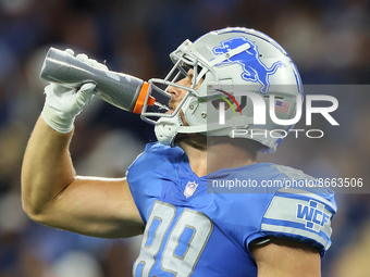 Tight end Brock Wright (89) of the Detroit Lions drinks water between plays during an NFL preseason football game between the Detroit Lions...